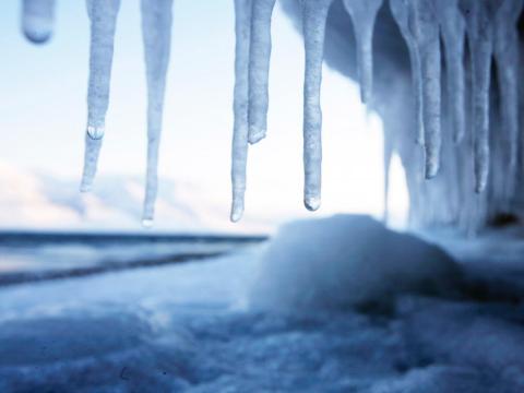 Coastal ice melts in the city of Longyearbyen, in Norway's Svalbard Islands, on February 27, 2008.