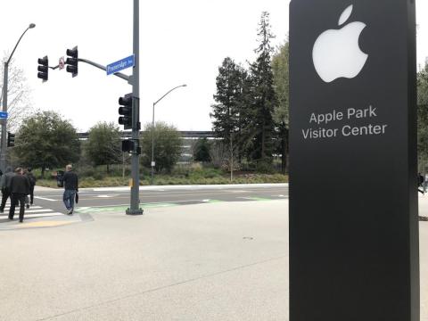 In front of the visitor center, you can see Apple's spaceship building across the street. In front of the visitor center, you can see Apple's spaceship building across the street.