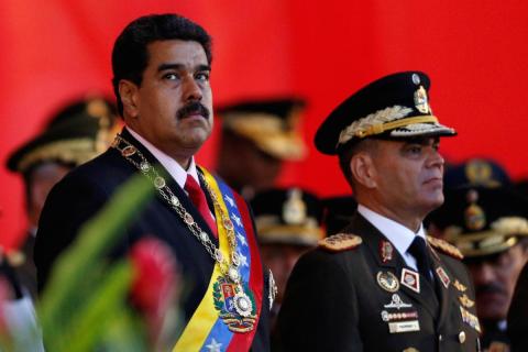 Venezuelan President Nicolas Maduro at a military parade to celebrate the 195th anniversary of the Battle of Carabobo, next to Venezuelan Defense Minister Vladimir Padrino Lopez, in Caracas, June 24, 2016. Venezuelan President Nicolas Maduro at a military parade to celebrate the 195th anniversary of the Battle of Carabobo, next to Venezuelan Defense Minister Vladimir Padrino Lopez, in Caracas, June 24, 2016.