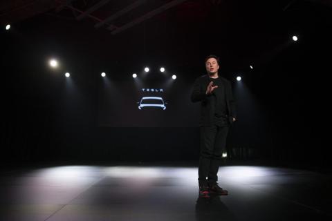 Tesla CEO Elon Musk speaks before unveiling the Model Y at Tesla's design studio Thursday, March 14, 2019, in Hawthorne, Calif. The Model Y may be Tesla's most important product yet as it attempts to expand into the mainstream and Tesla CEO Elon Musk speaks before unveiling the Model Y at Tesla's design studio Thursday, March 14, 2019, in Hawthorne, Calif. The Model Y may be Tesla's most important product yet as it attempts to expand into the mainstream and