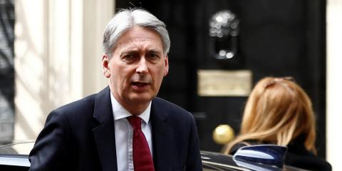 Britain's Chancellor of the Exchequer Philip Hammond is seen outside Downing Street in London Britain's Chancellor of the Exchequer Philip Hammond is seen outside Downing Street in London