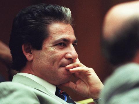 Defense attorney for O.J. Simpson, Robert Kardashian sits in a court in Los Angeles Friday, June 9, 1995.