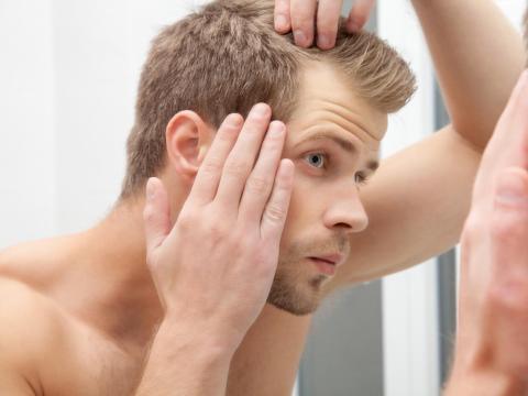 Hair loss could be a symptom of a larger medical issue. Hair loss could be a symptom of a larger medical issue.