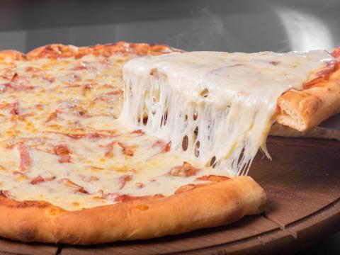 The previous record was a pizza with 111 types of cheese.