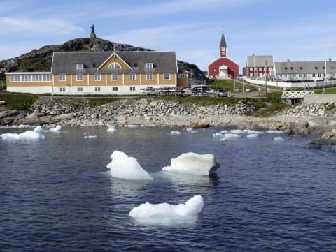 Small pieces of ice float in the water off the shore in Nuuk, Greenland on June 13, 2019. Small pieces of ice float in the water off the shore in Nuuk, Greenland on June 13, 2019.