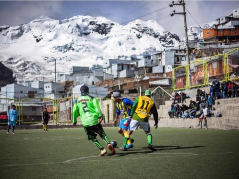 Locals have to find old-fashioned ways of entertaining themselves and often meet in cafés built for the miners. This picture taken by Walker Dawson shows the local soccer team put together by the miners.