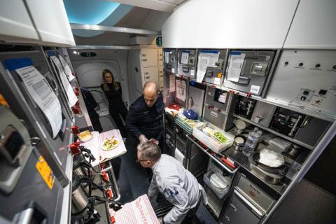 The tiny little galley was a flurry of activity — basically a fully functional kitchen in the sky.