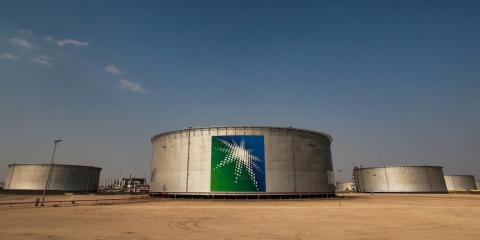 FILE PHOTO: A view shows branded oil tanks at Saudi Aramco oil facility in Abqaiq FILE PHOTO: A view shows branded oil tanks at Saudi Aramco oil facility in Abqaiq