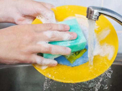 Washing the dishes.