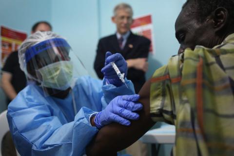 A nurse administers an injection on the first day of the Ebola vaccine study being conducted at Redemption Hospital, formerly an Ebola holding center, on February 2, 2015 in Monrovia, Liberia.