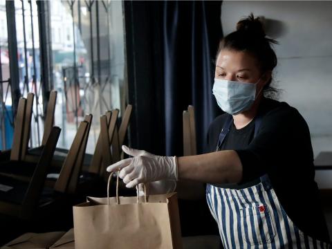 Kim Alter, the chef and owner of Nightbird Restaurant — not the restaurant that the researchers focused on — prepares meals that were delivered to hospital workers in San Francisco on March 27.