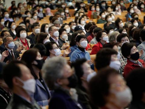 People wearing face masks attend a service at the Yoido Full Gospel Church in Seoul, South Korea, on May 10.