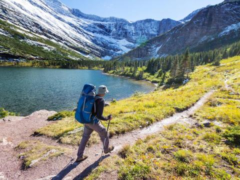 A person hiking in Glacier National Park.