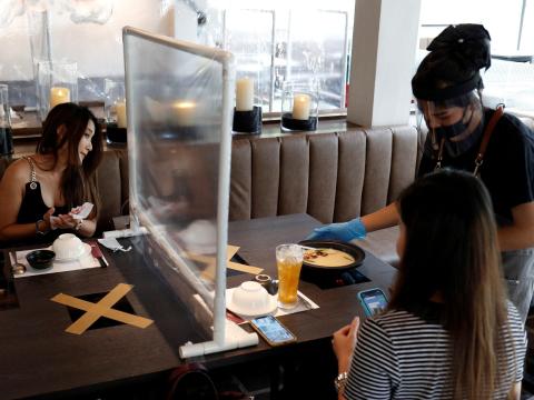 But in some places, a plastic divider is not enough. Diners in this Bangkok restaurant, for example, have been asked to sit diagonally from each other to maximize their distance. But in some places, a plastic divider is not enough. Diners in this Bangkok restaurant, for example, have been asked to sit diagonally from each other to maximize their distance.
