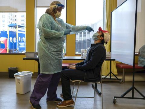 A college student in Chicago, Illinois, gets tested for coronavirus.
