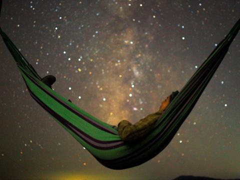 The Geminids meteor shower peaks this weekend, with hundreds of multicolored shooting stars. Here's how to watch.