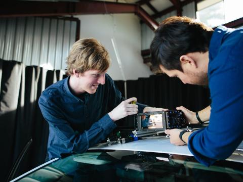 Russell installing Luminar lidar in a vehicle.