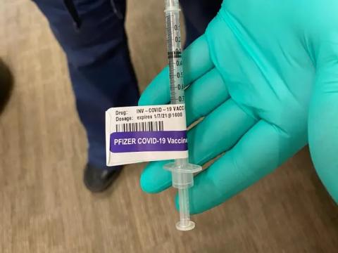 The second dose of the COVID-19 vaccine that Henningsen received. 