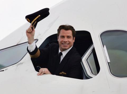 John Travolta en un avión John Travolta en un avión