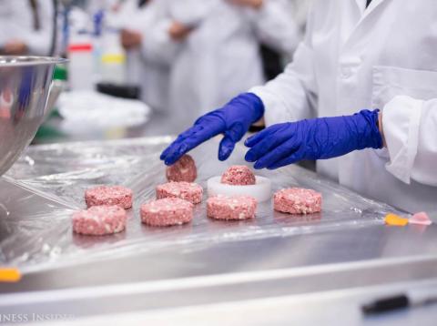 A worker at Impossible Foods prepares the startup's plant-based burger at its headquarters in San Francisco, California. A worker at Impossible Foods prepares the startup's plant-based burger at its headquarters in San Francisco, California.