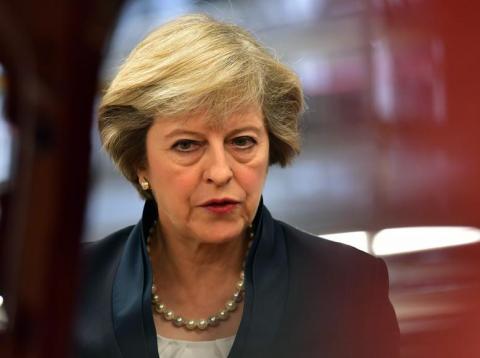 British Prime Minister Theresa May views a car on a production line during a visit to the Jaguar Land Rover factory on September 1, 2016 in Solihull, England. British Prime Minister Theresa May views a car on a production line during a visit to the Jaguar Land Rover factory on September 1, 2016 in Solihull, England.