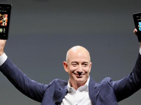 Amazon CEO Jeff Bezos holds up the new Kindle Fire HD 7" and Kindle Fire HD 8.9" (L) during Amazon's Kindle Fire event in Santa Monica, California September 6, 2012. Amazon CEO Jeff Bezos holds up the new Kindle Fire HD 7" and Kindle Fire HD 8.9" (L) during Amazon's Kindle Fire event in Santa Monica, California September 6, 2012.