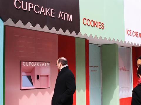 Sprinkles cupcakes has a vending machine attached to some of their stores. Sprinkles cupcakes has a vending machine attached to some of their stores.