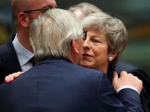 Theresa May y Jean-Claude Juncker. Theresa May y Jean-Claude Juncker.