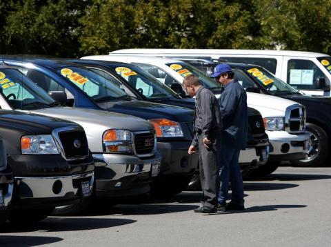 Checking out used cars. Checking out used cars.