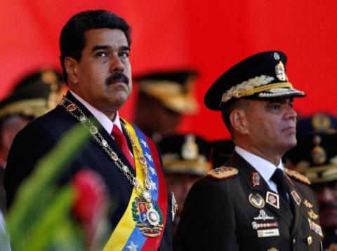 Venezuelan President Nicolas Maduro at a military parade to celebrate the 195th anniversary of the Battle of Carabobo, next to Venezuelan Defense Minister Vladimir Padrino Lopez, in Caracas, June 24, 2016. Venezuelan President Nicolas Maduro at a military parade to celebrate the 195th anniversary of the Battle of Carabobo, next to Venezuelan Defense Minister Vladimir Padrino Lopez, in Caracas, June 24, 2016.
