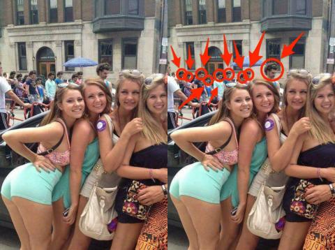 Most viewers miss the same-headed people in the background. Most viewers miss the same-headed people in the background.