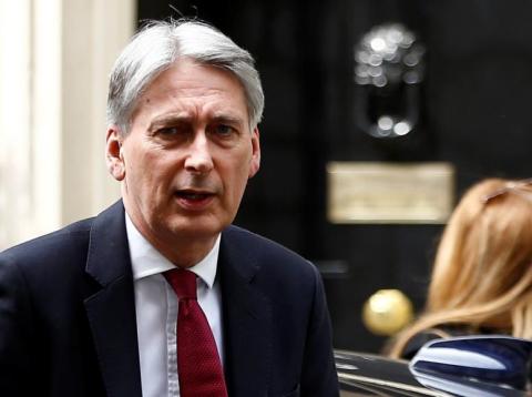 Britain's Chancellor of the Exchequer Philip Hammond is seen outside Downing Street in London Britain's Chancellor of the Exchequer Philip Hammond is seen outside Downing Street in London