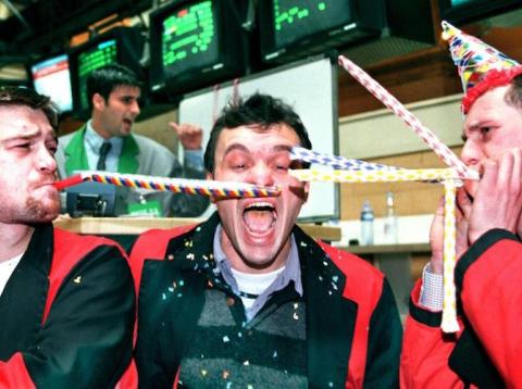 Traders celebrating a record-setting day of shorting volatility. Traders celebrating a record-setting day of shorting volatility.