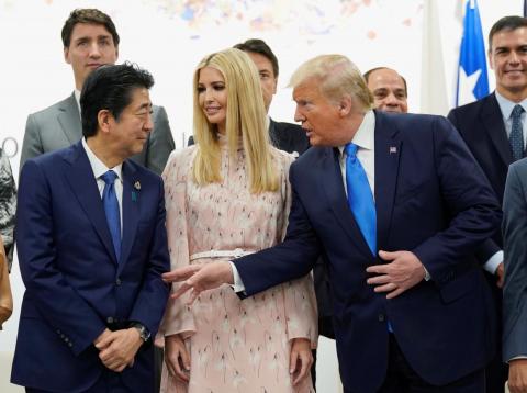 U.S. President Donald Trump speaks with Japan's Prime Minister Shinzo Abe as White House senior advisor Ivanka Trump looks on during a women's empowerment event during the G20 leaders summit in Osaka, Japan, June 29, 2019. U.S. President Donald Trump speaks with Japan's Prime Minister Shinzo Abe as White House senior advisor Ivanka Trump looks on during a women's empowerment event during the G20 leaders summit in Osaka, Japan, June 29, 2019.