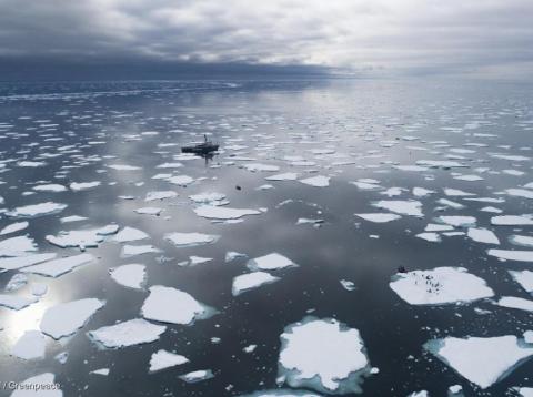 The ship Arctic Sunrise surrounded by ice floes in the ocean near Svalbard, Norway. The ship Arctic Sunrise surrounded by ice floes in the ocean near Svalbard, Norway.