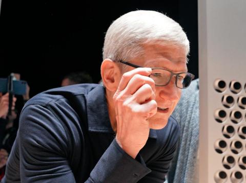 Apple CEO Tim Cook with some perfectly normal, analog glasses. Apple CEO Tim Cook with some perfectly normal, analog glasses.